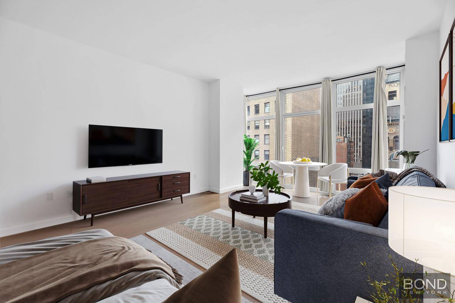 Modern Midtown Escape with Dazzling Skyline ViewsStep into Residence 12F at 1600 Broadwaya sun drenched studio that puts you right in the heart of Manhattans energy while offering a calm, ...