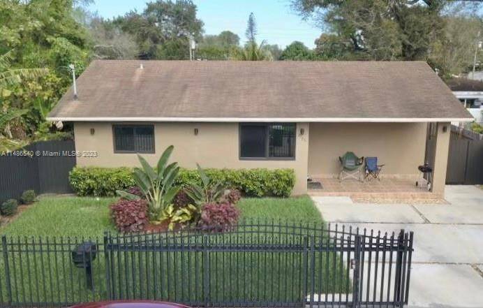 Beautiful one story 3 2 home in Miami with Open layout floor plan, Hurricane proof windows and Front door allowing natural light.