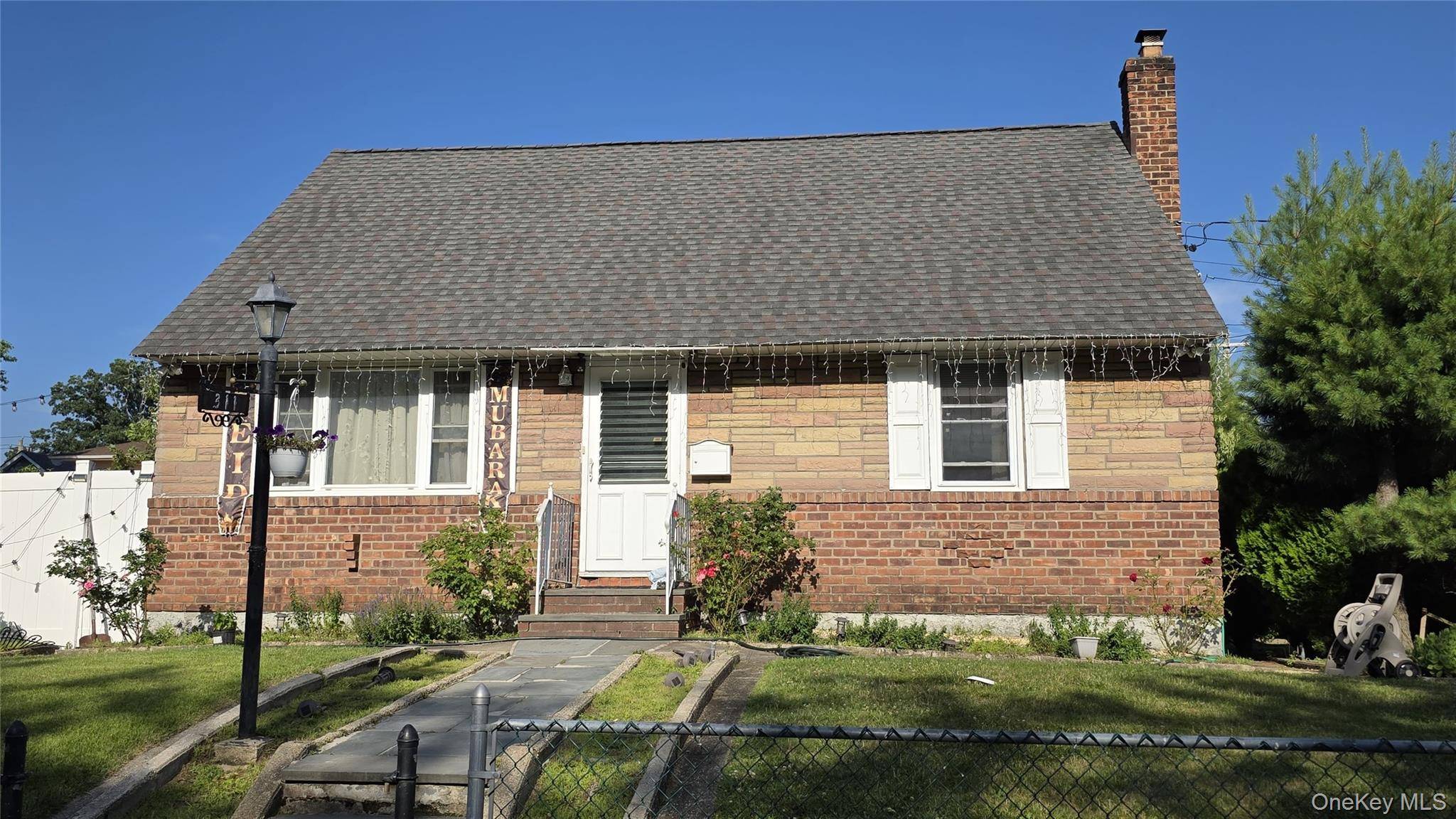 Beautiful Cape house ! 4 big bedrooms, finished basement can be rented, Private laundry area for 1st floor, in perfect location in Elmont.