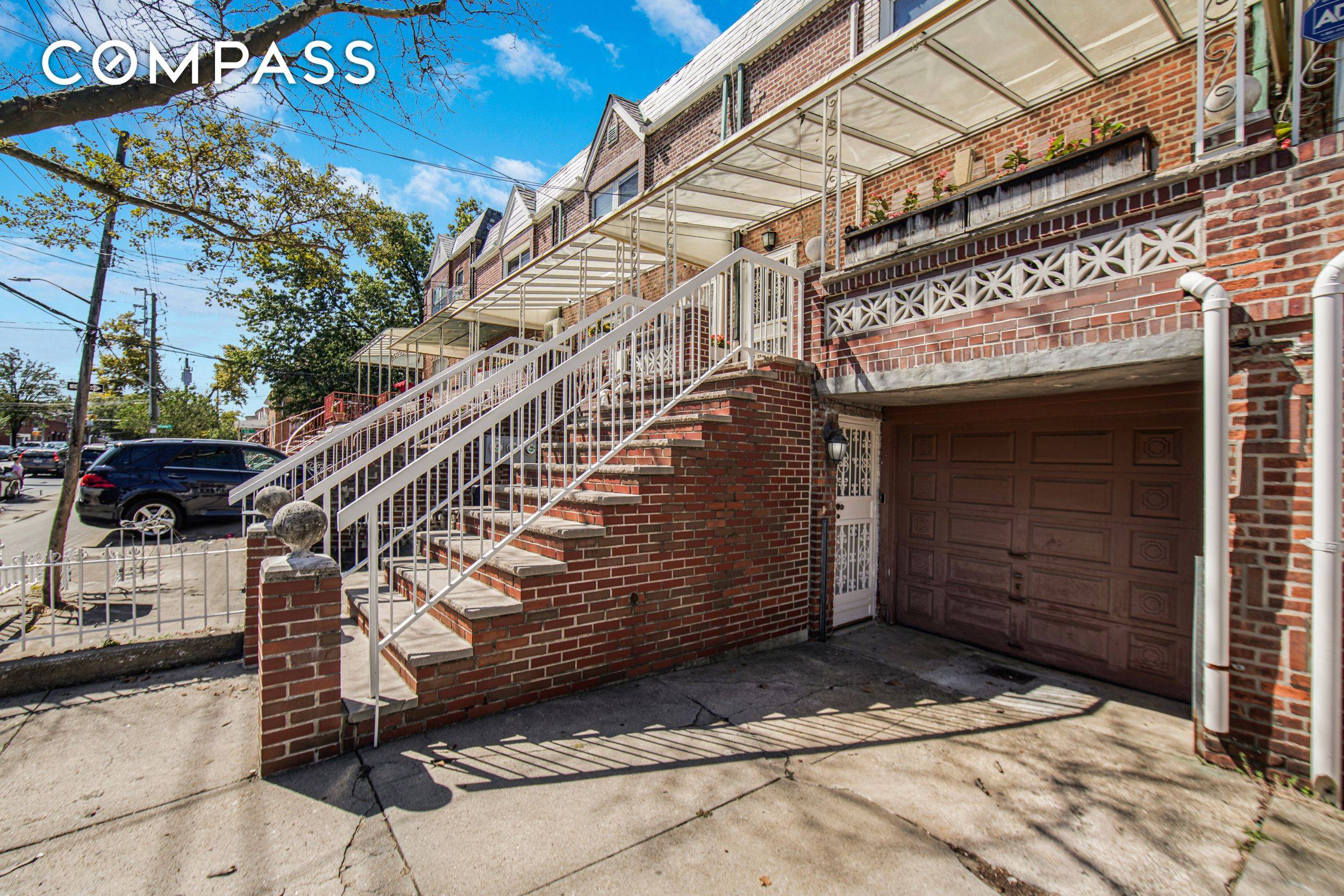 Fully Renovated Three Family Brick Home with Private Drive amp ; Garage in Dyker Heights.
