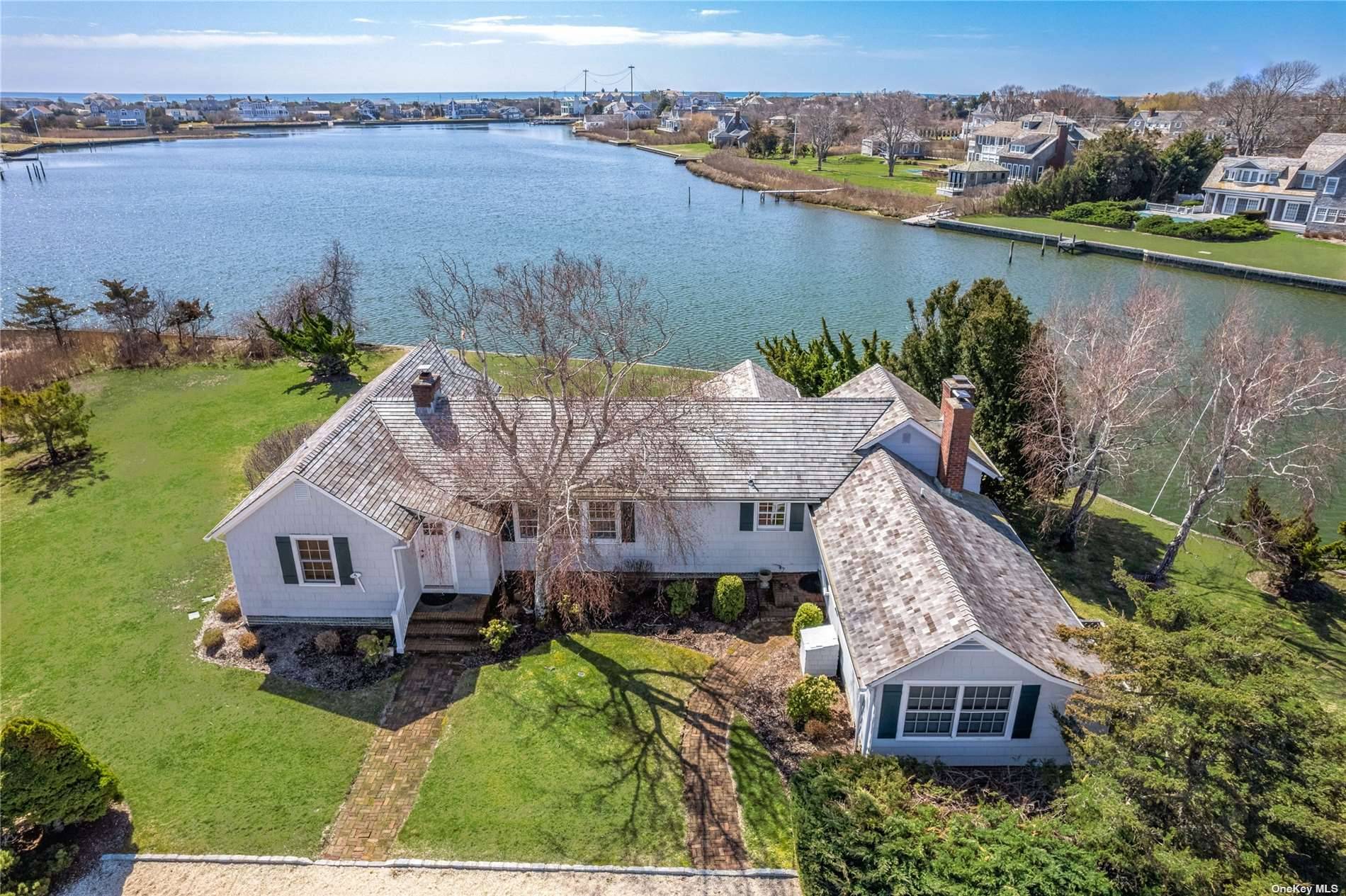 QUOGUE ESTATE SECTION WATERFRONT COTTAGE.