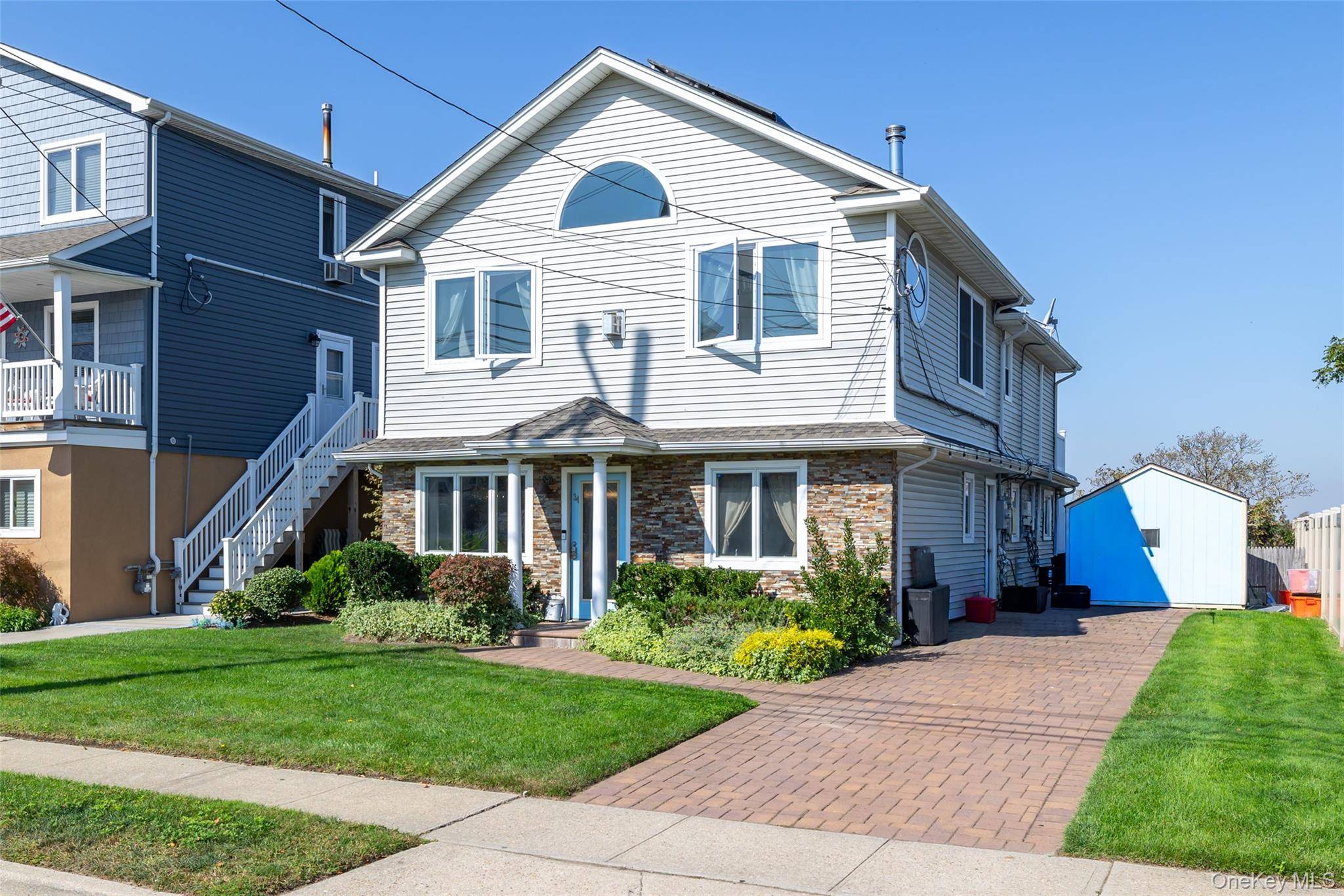 THIS BEAUTIFUL BEACHFRONT 4 BEDROOM, 3 BATHROOM BOASTS THE MOST SPECTACULAR SUNSETS YOU WILL FIND !