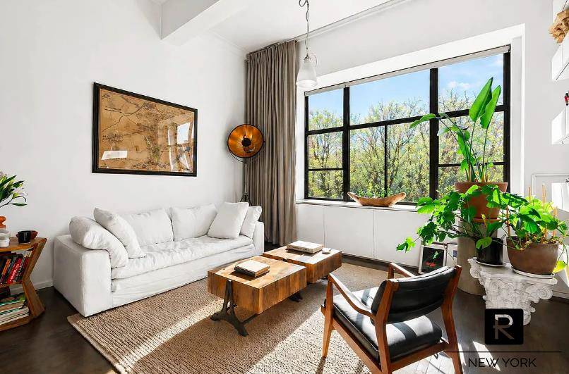 Sun drenched West Village loft with soaring ceilings.