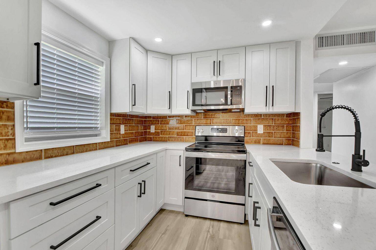 Motivated Seller Step into this exquisite 2 bedroom, 2 bathroom condominium situated in the heart of an esteemed 55 golf community.