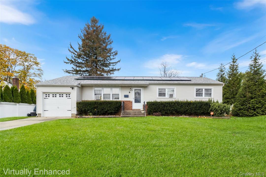 This fantastic expanded ranch style home in the Elwood school district is ready for its new owners.