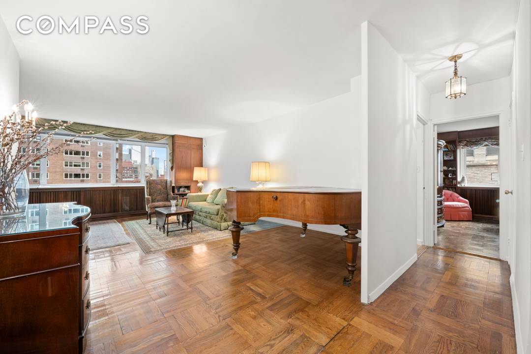 Welcome to this expansive two bedroom, two bath residence at The Coliseum, located at 30 West 60th Street.
