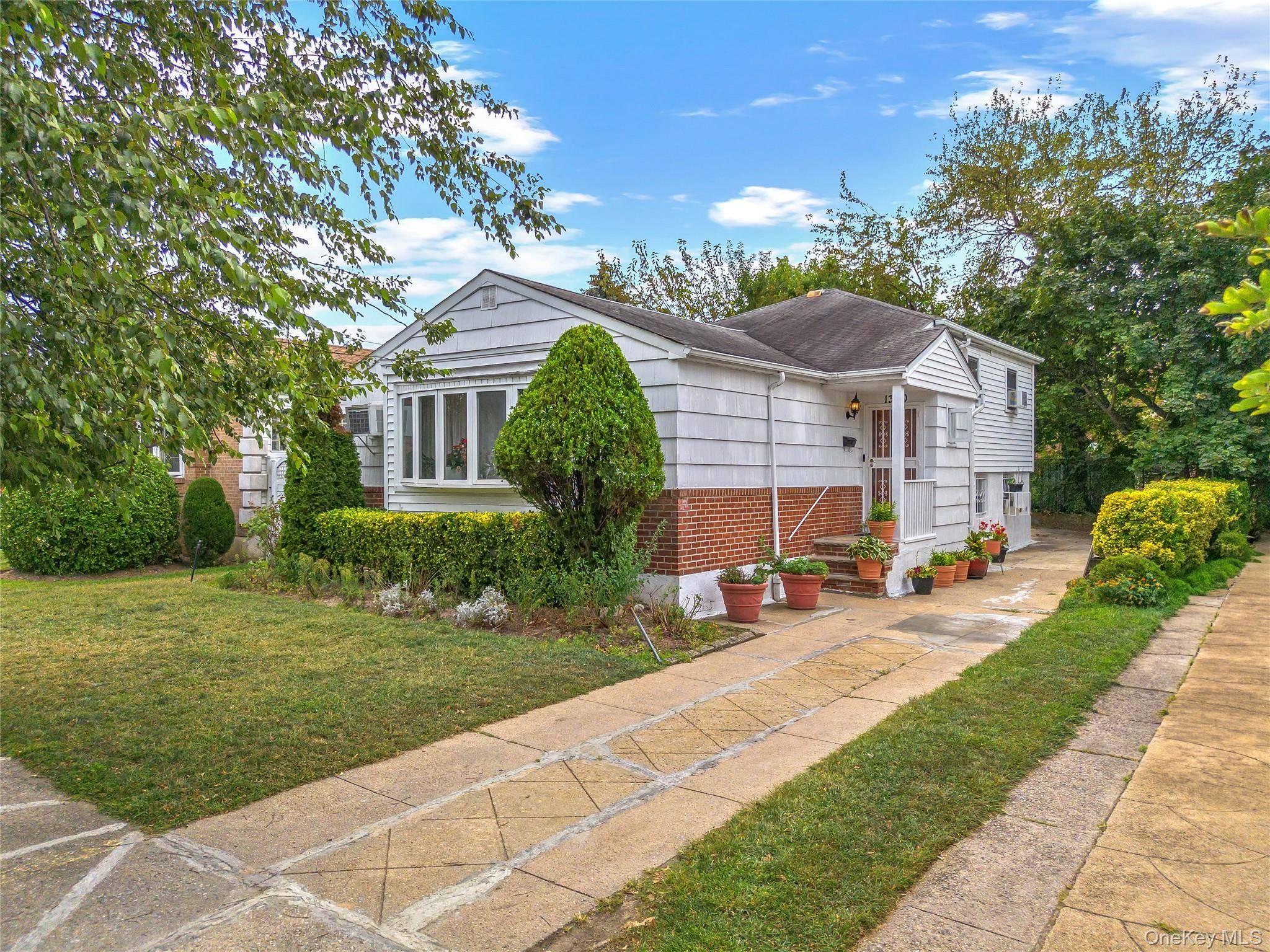 Welcome to 1302 E 101st Street, a Charming Single Family Home !