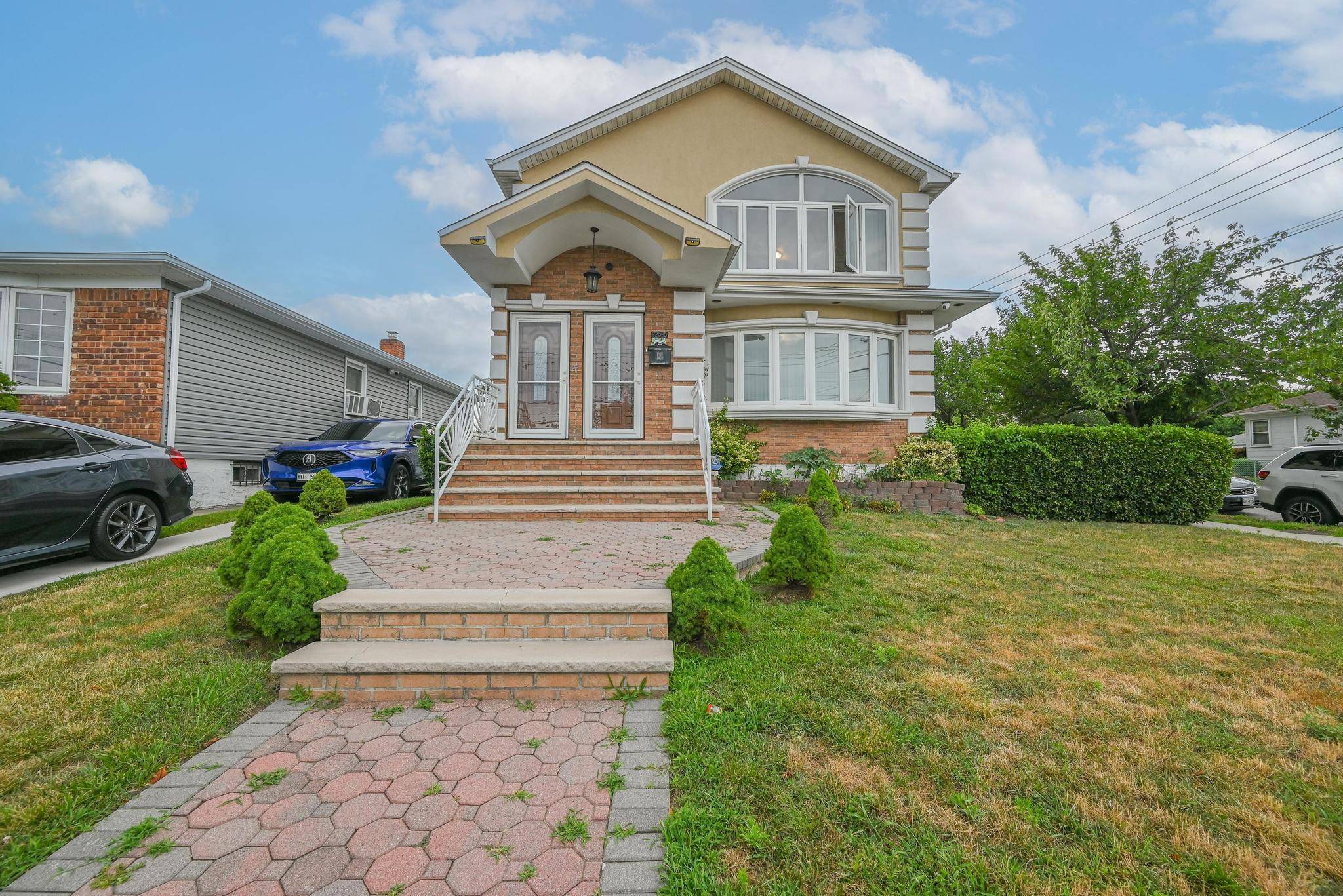 Beautifully maintained brick stucco front two family corner property in one of Queens' most desirable neighborhoods sitting on a 45x105 lot with very spacious yard including car ports and a ...
