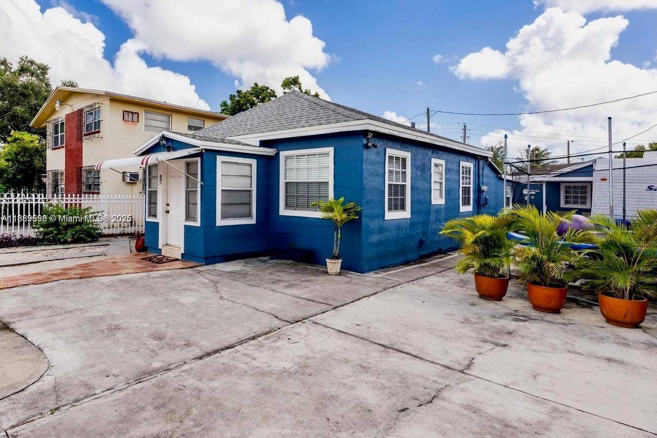 Legal Duplex operating as a Triplex, offers a large primary unit 3 1 with a studio attached and back detached 1 1 building.