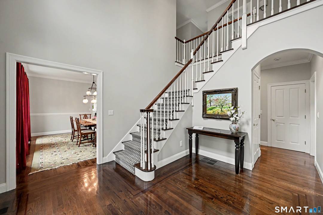 Move right into this beautifully updated Darien home offering an exceptional blend of modern luxury, open concept living, and commuter convenience.