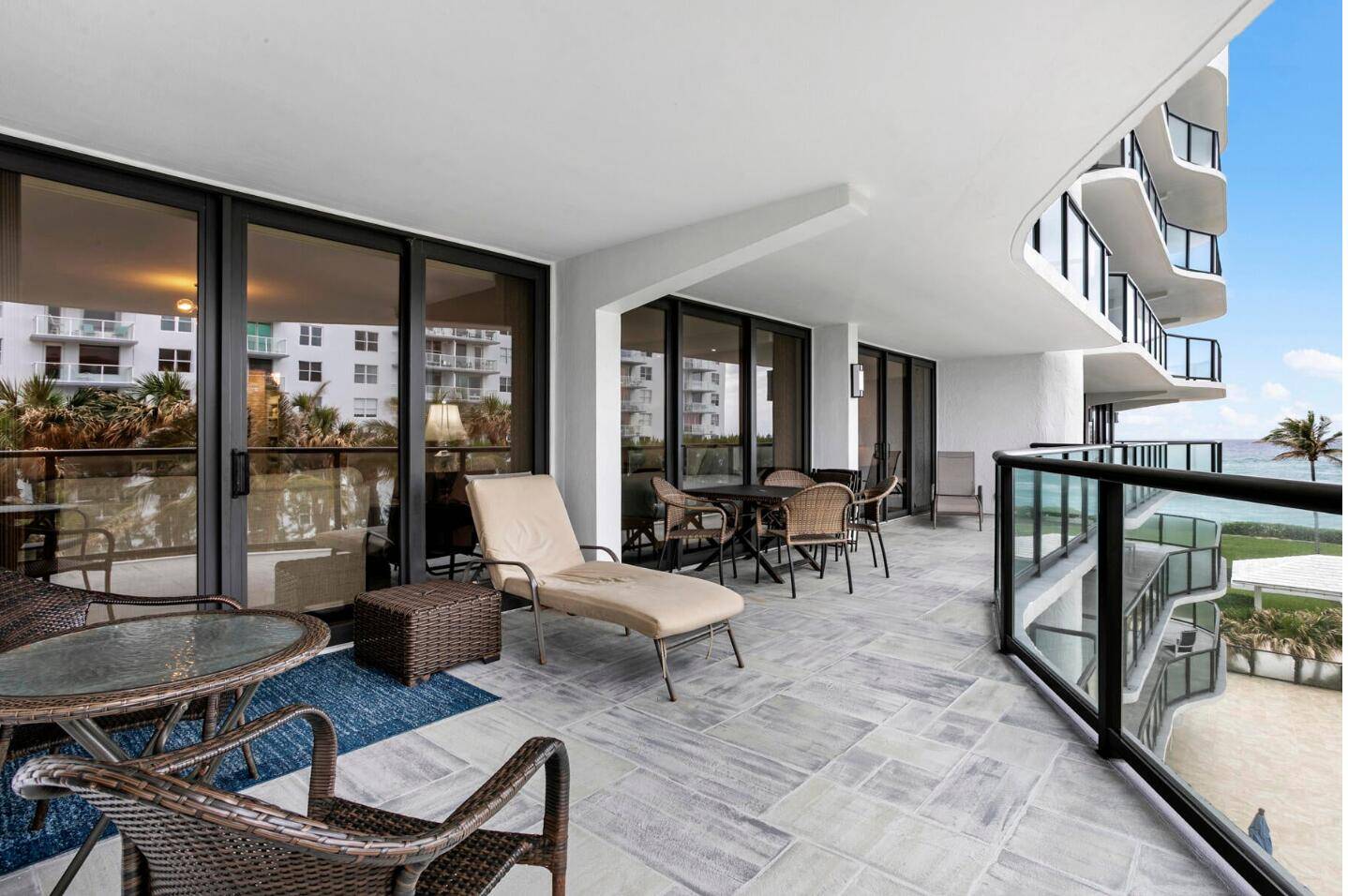 Renovated and furnished condo with 3 bedrooms, 2 1 2 baths, and a large open kitchen with breakfast bar and eating area.
