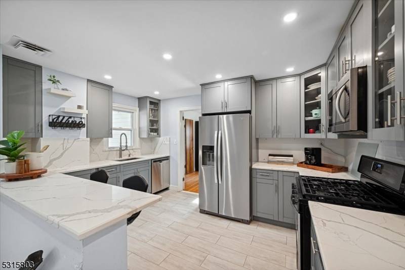 STUNNING 4 Bedroom split level colonial in the coveted St.