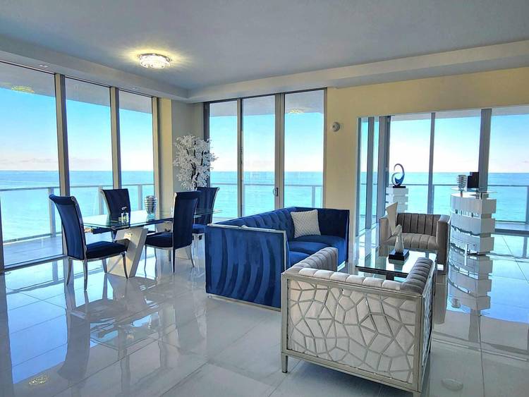 Luxurious oceanfront condo with spacious open layout overlooking the Atlantic Ocean.