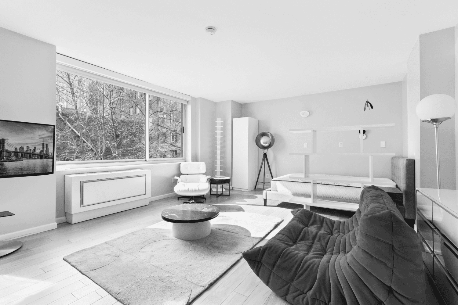 This furnished large sized east facing bright studio is located in the Battery Park City neighborhood of Manhattan.