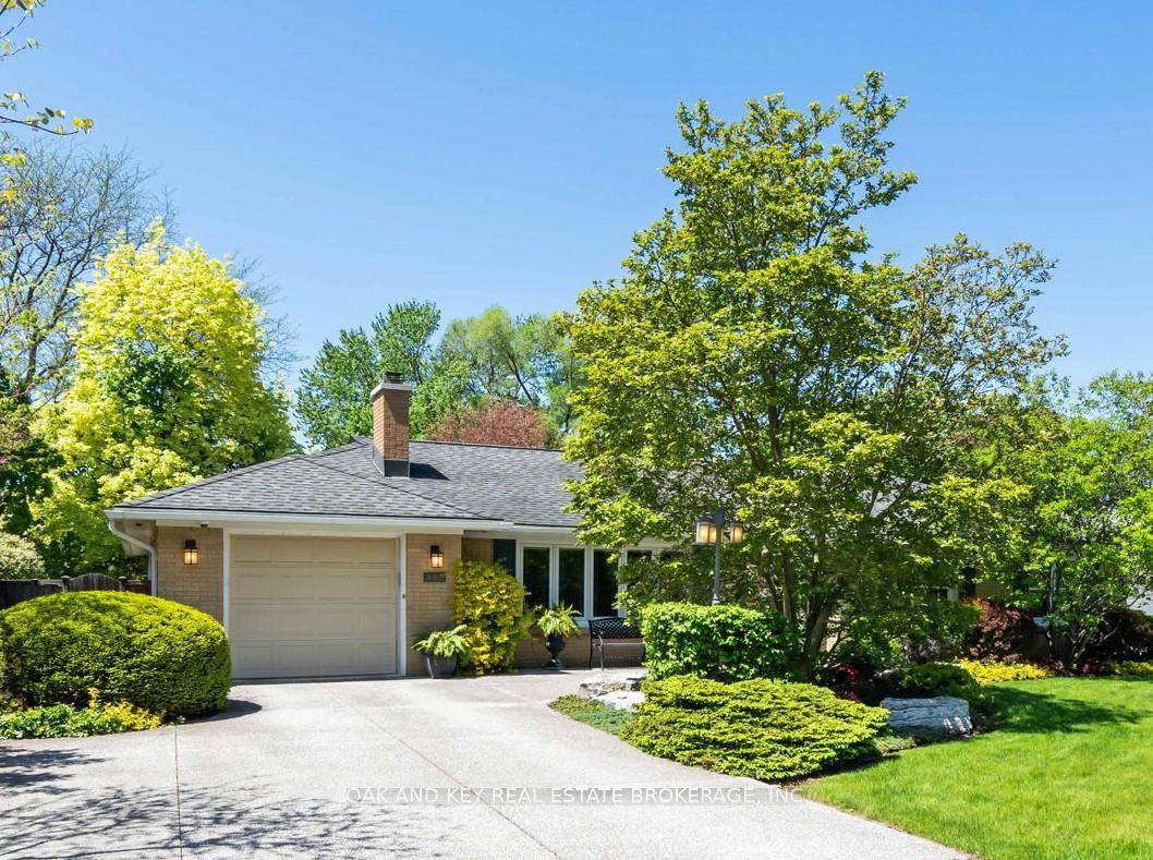 Discover one of the most tranquil and picturesque backyards in the heart of the city, set on a stunning 75 x 200 landscaped lot.