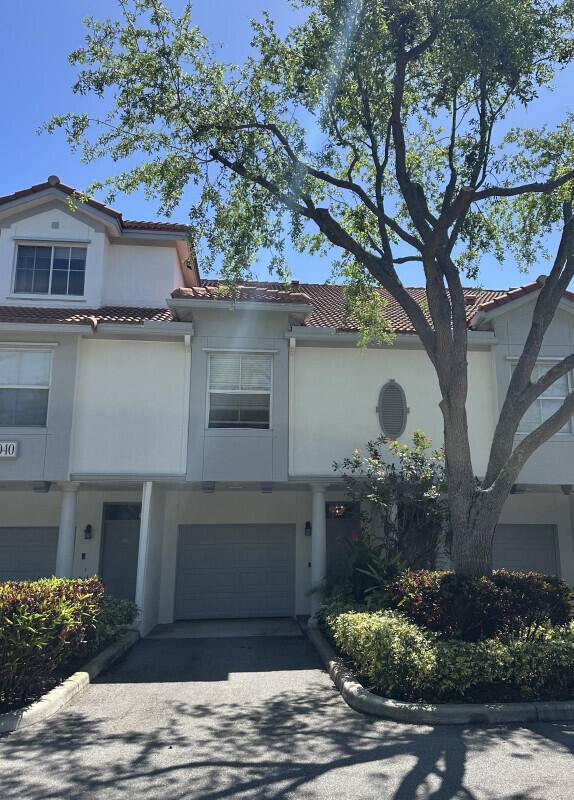 Welcome to a rarely available, direct lakefront, 3 floor Townhouse in a prime location in EAST DELRAY !