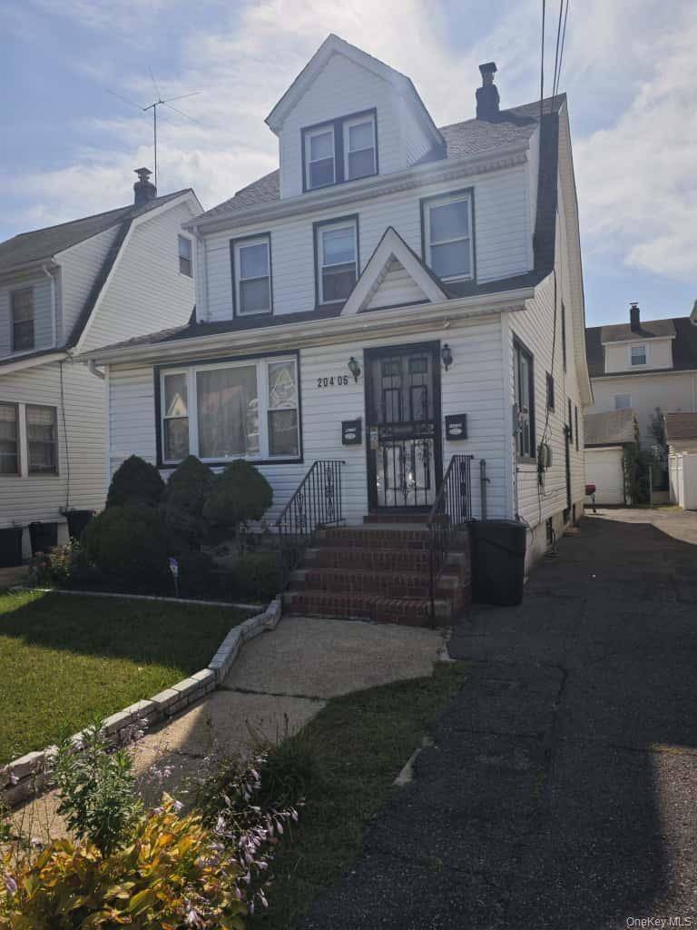This detached Colonial style home with a classic two and a half story layout offers a long private driveway, a brick step entry, and plenty of natural light throughout.