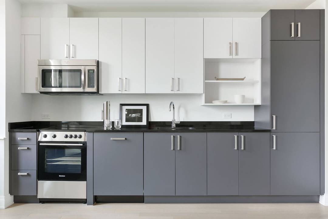 Oversized studio with private terrace, in unit washer dryer, and wood floors.