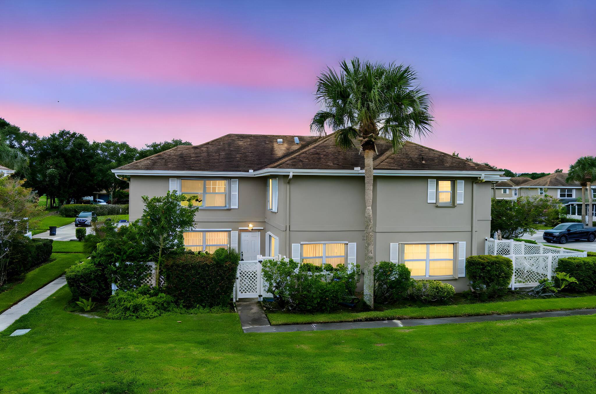 Welcome to your lakefront retreat in gated Sunset Trace !