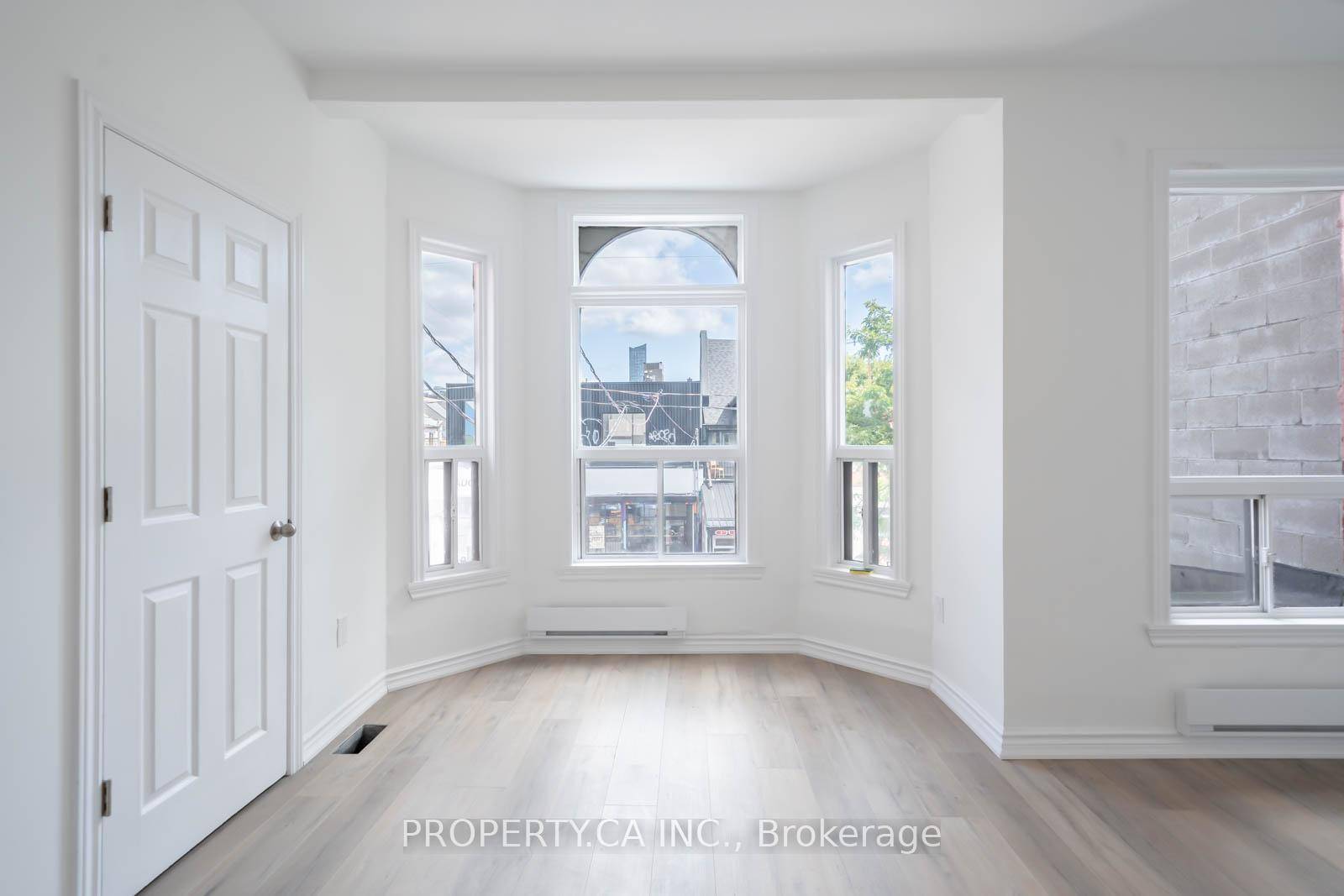 Experience the best of city living in this beautifully renovated 3 bedroom plus den apartment spanning the 2nd and 3rd floors of a well maintained downtown property.