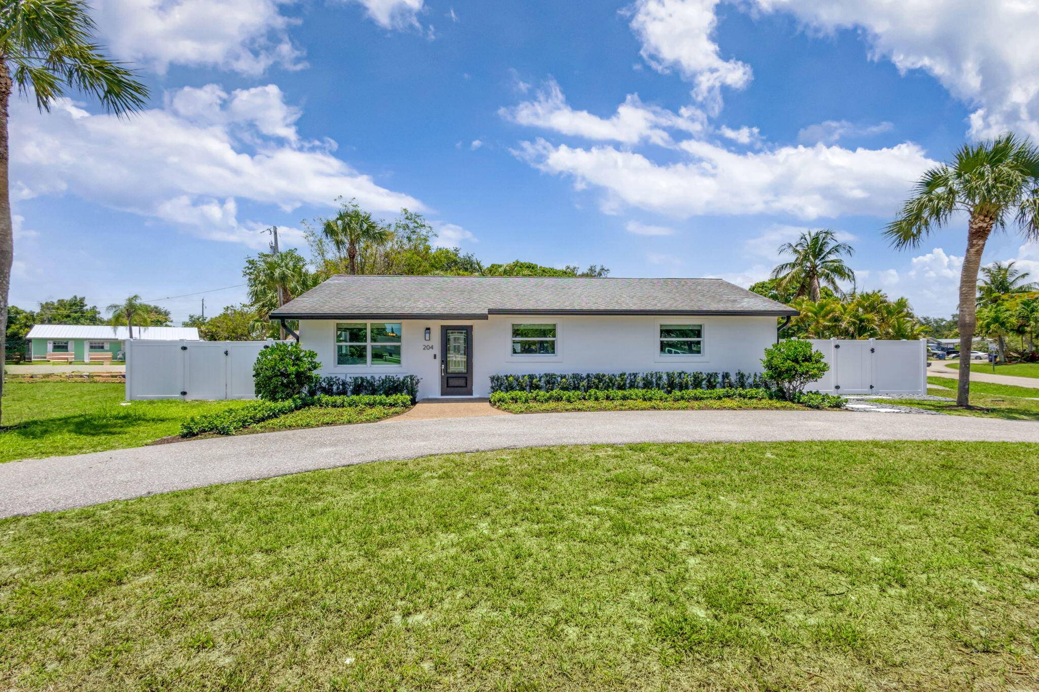 Beautifully remodeled 3 bedroom 2 bathroom home in the heart of Jupiter that features an open floor plan, natural light, fresh interior and exterior paint, and new gutters.
