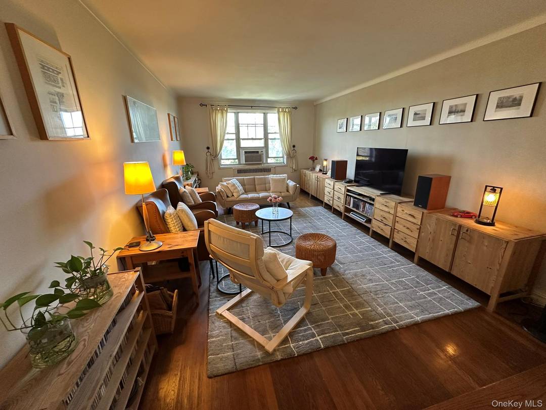 A Gem in Forest Hills. Welcome to this rarely available corner apartment, a true gem within the highly sought after Forest Hills South community.