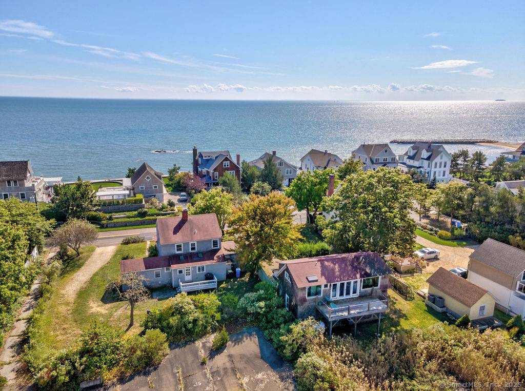 Charming beach home with full guest apartment above garage across the street from Long Island Sound.