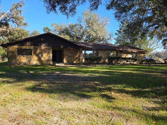 Bring the horses to this beautiful, secluded home on eleven acres with over 6 acres of cleared pasture.