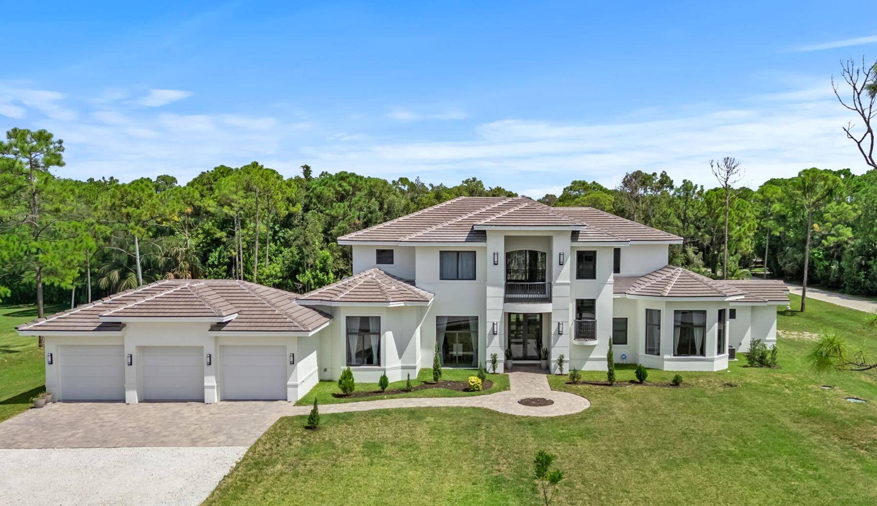 Dramatically reduced, now 400K under recent appraisal, this brand new 2024 build, in Palm Beach Country Estates, is the best value around.