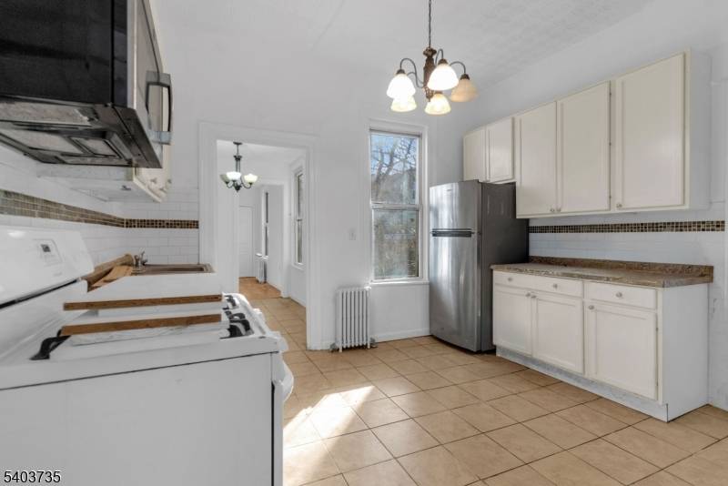 Charming Legal 2 Family in Prime Weehawken with NYC Views Outdoor SpaceTucked away on a quiet street just one block from direct NYC bus lines, this legal 2 family home ...