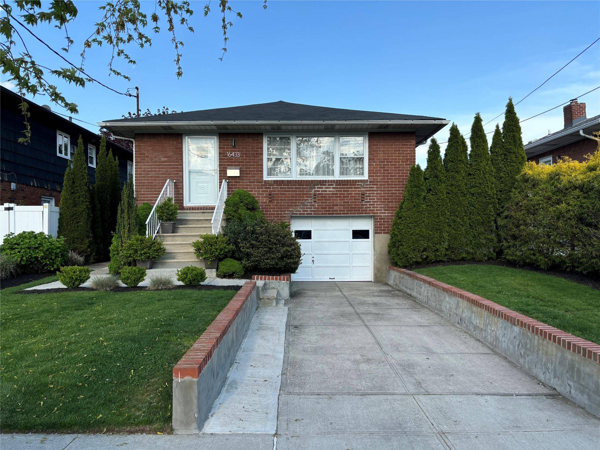 This impeccably maintained mother daughter style hi ranch features 4 spacious bedrooms, 2.