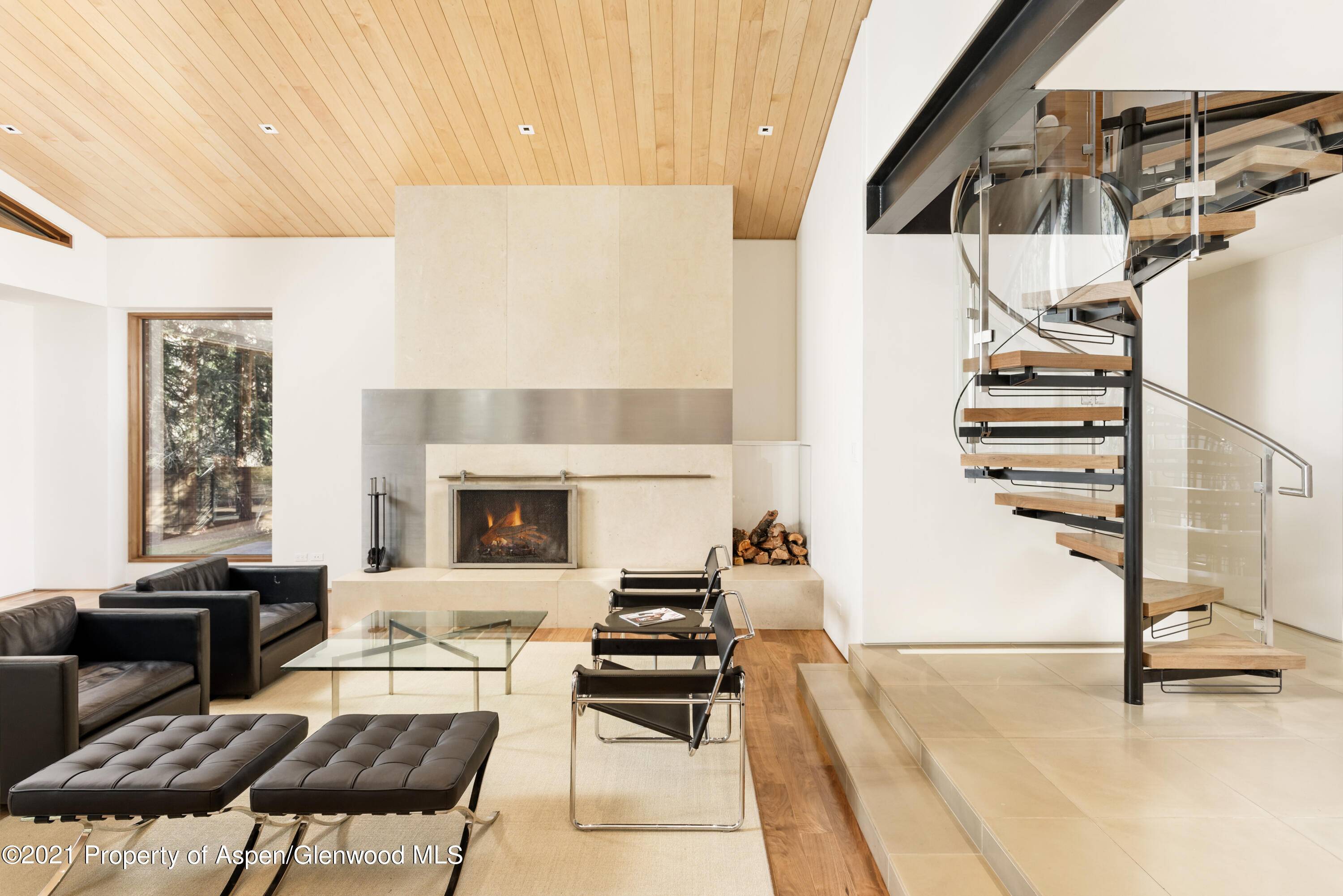 Nestled on a serene half acre lot, this contemporary custom home offers luxury, privacy, and convenience with a spa like feel.