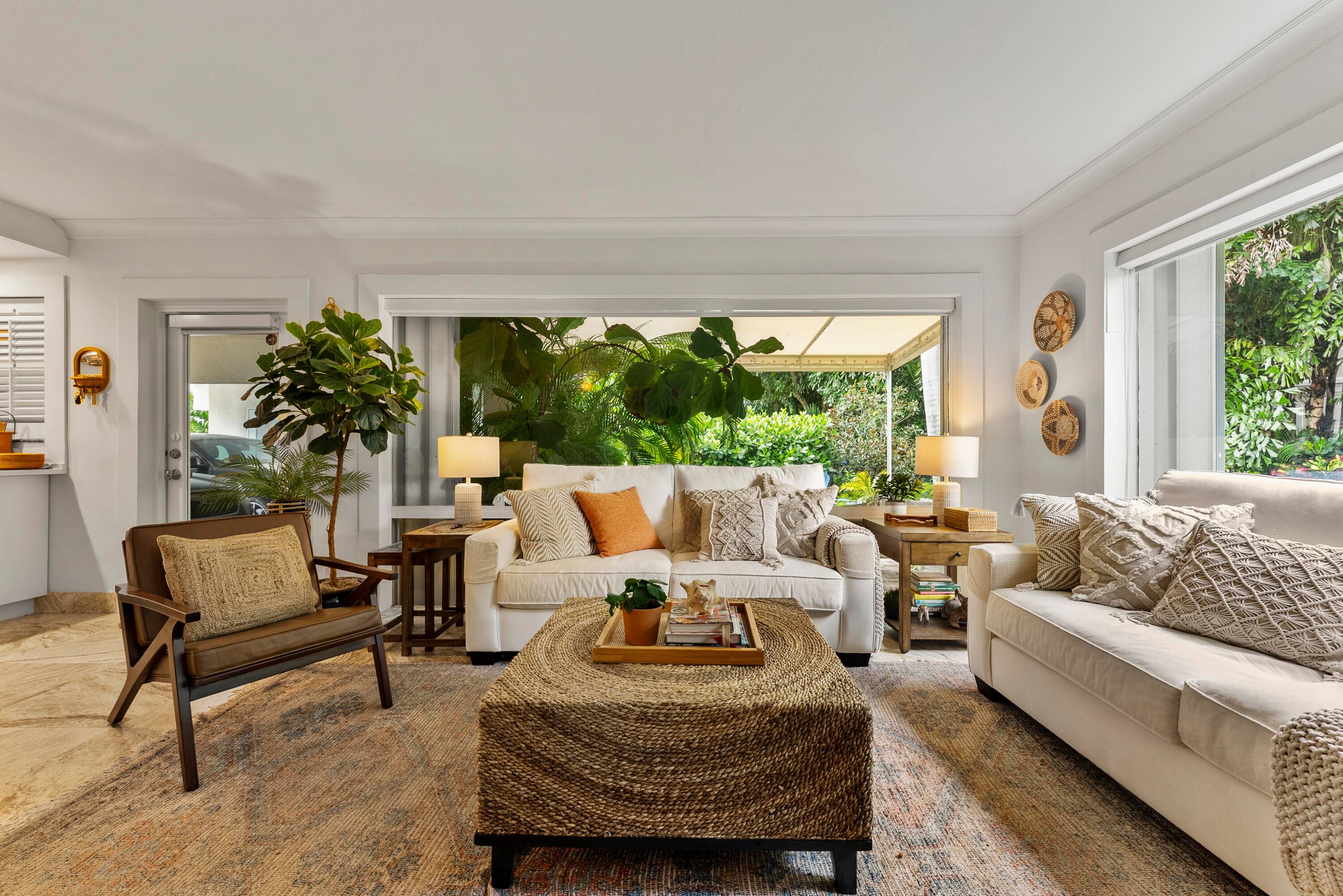 WATERFRONT 1ST FLOOR VILLA W INTRACOASTAL VIEWS, OVERSIZED PRIVATE PATIO OASIS ON SITE BEACH ACCESS.