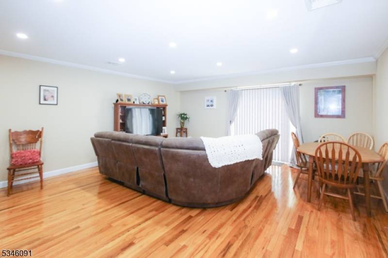 This spacious 2 bedroom 1 bath condominium in the heart of the Ironbound, is on the 1st floor above the its own private 1 car garage !