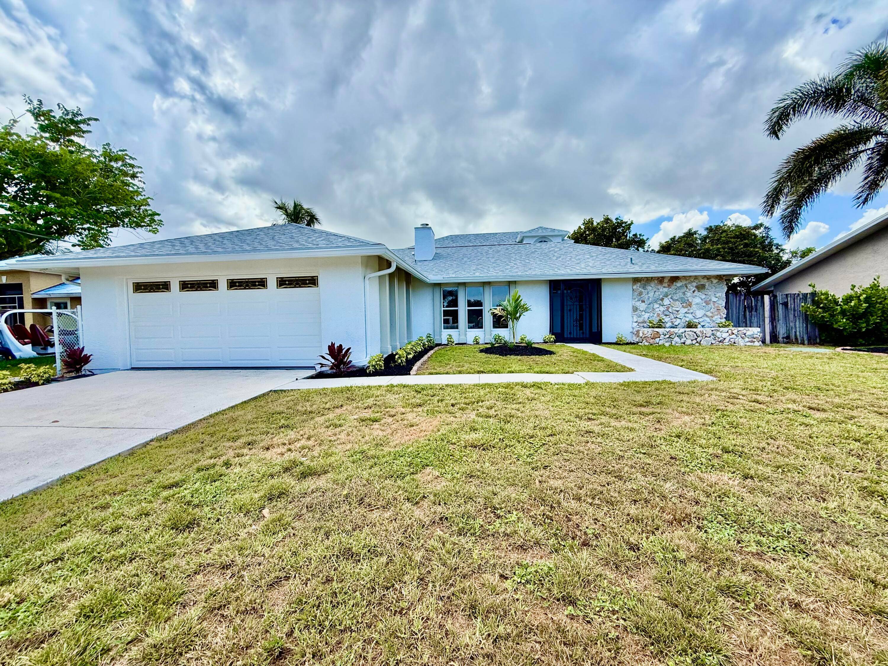 Fully Remodeled 4 Bedroom Home with Canal Views !