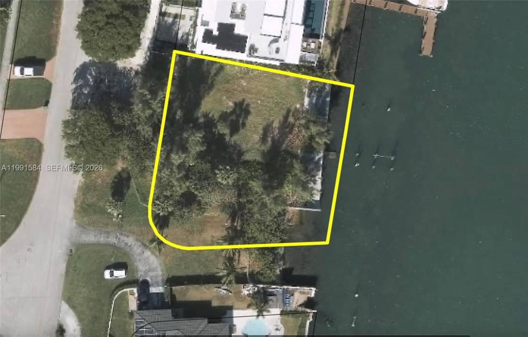 Incredible opportunity to build your dream waterfront estate on this oversized 12, 764 SF lot with sweeping panoramic bay views.