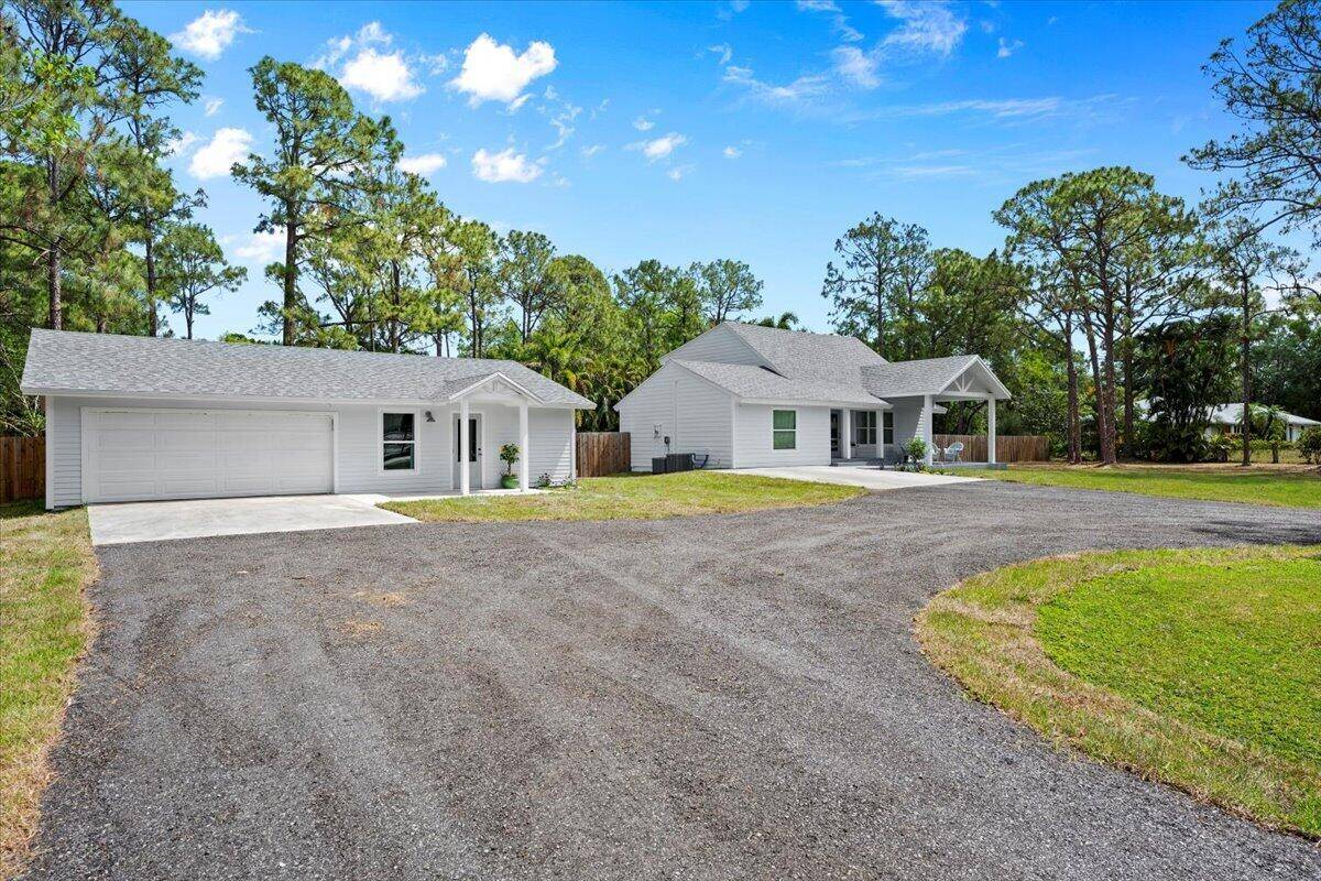 Stunning Fully Renovated Home with Guesthouse in Jupiter Farms !