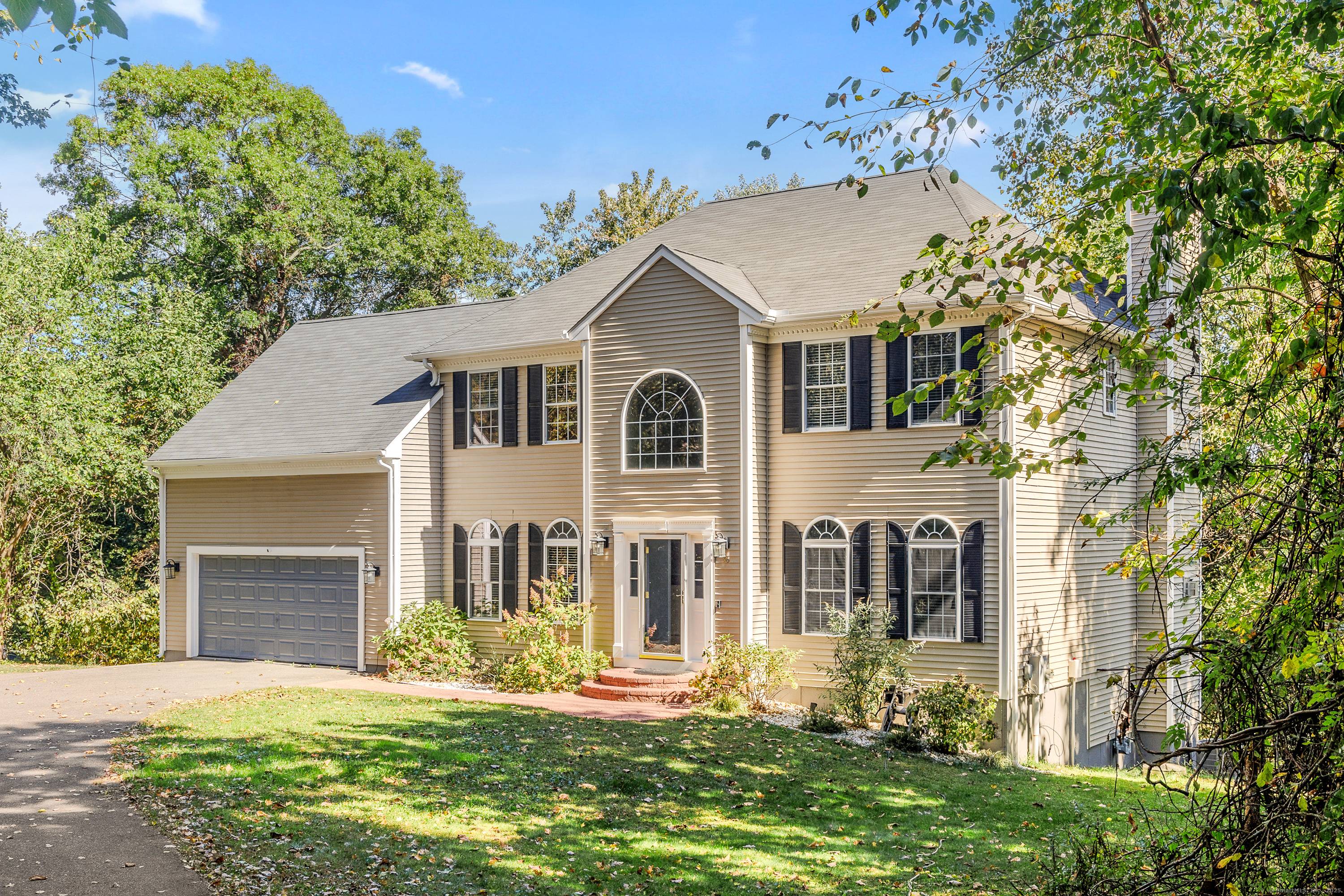 Introducing this lovely four bedroom, two and a half bath Colonial offering over 2500 sq ft, with an additional 1, 222 sq feet in the finished lower level.