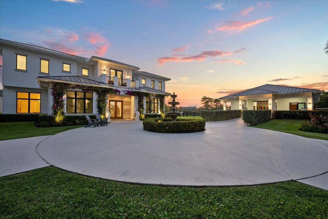 Imagine waking up to a gorgeous sunrise on your private 5 acre horse farm in the gated equestrian community of Homeland, just 10 minutes from Wellington International Show Grounds.