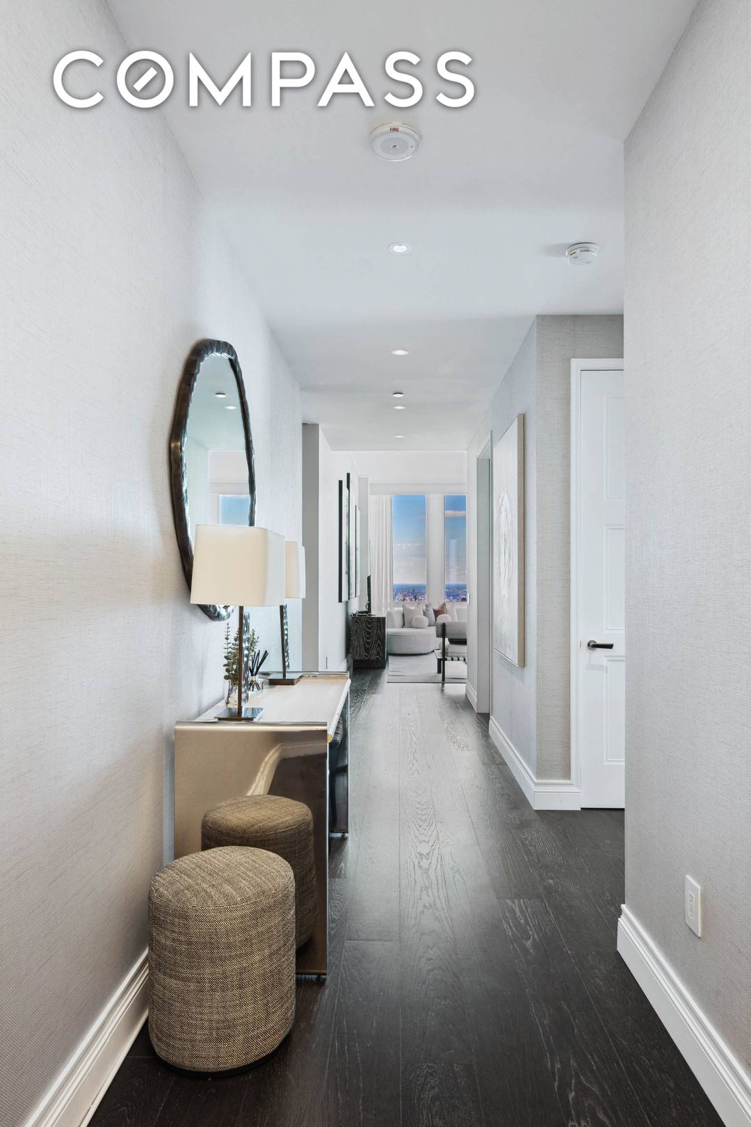 This impeccably designed three bedroom residence showcases nearly 11 foot lofted ceilings and sweeping uptown skyline views from its corner Great Room.