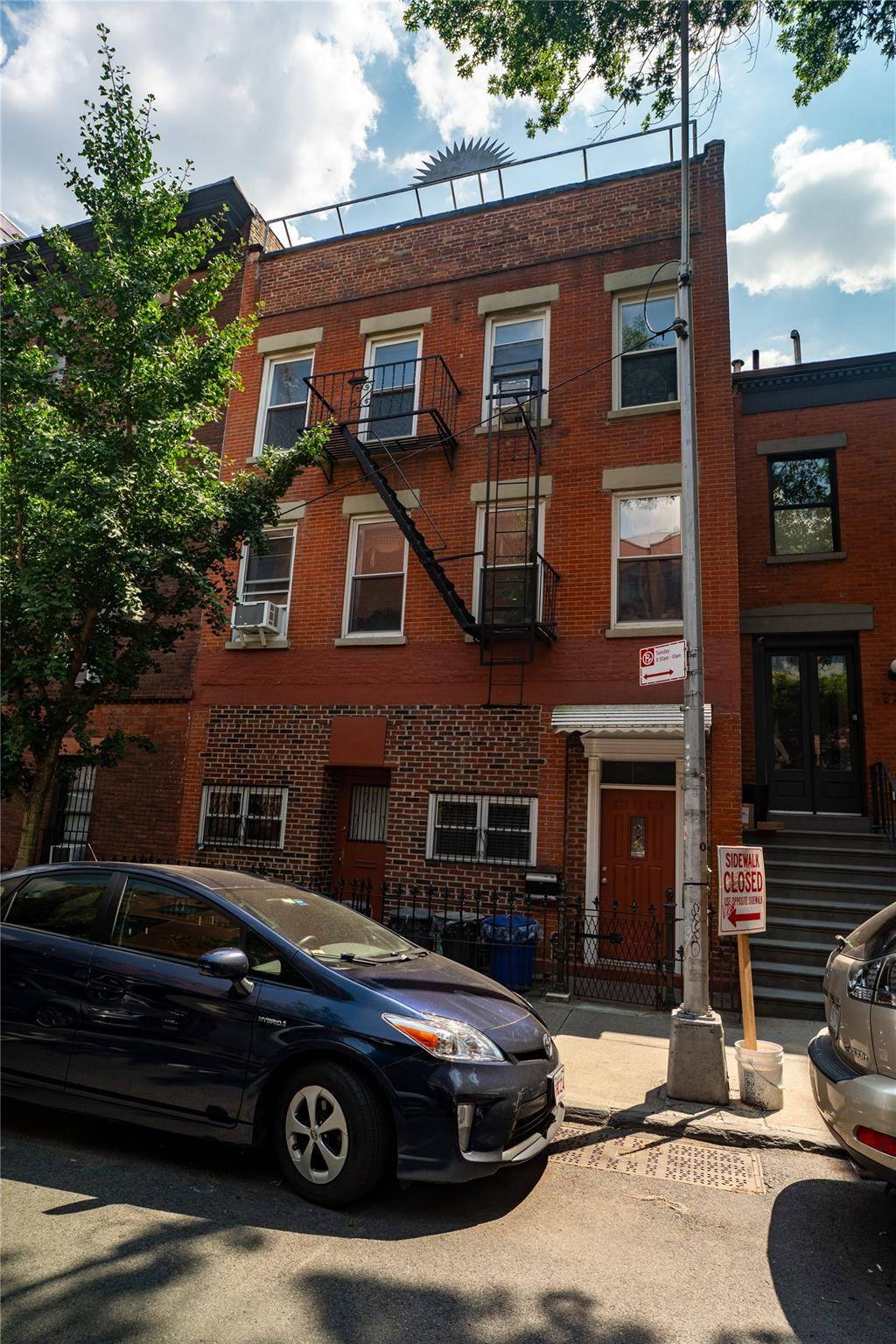 Welcome to a truly one of a kind three family townhouse in the heart of coveted Boerum Hill.