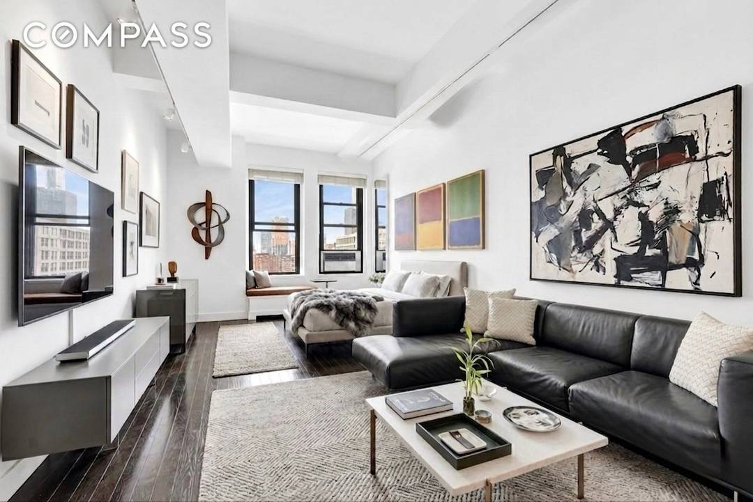 Apartment 17D at 315 7th Avenue offers a rare blend of volume, light, and quiet sophistication in the heart of Chelsea.
