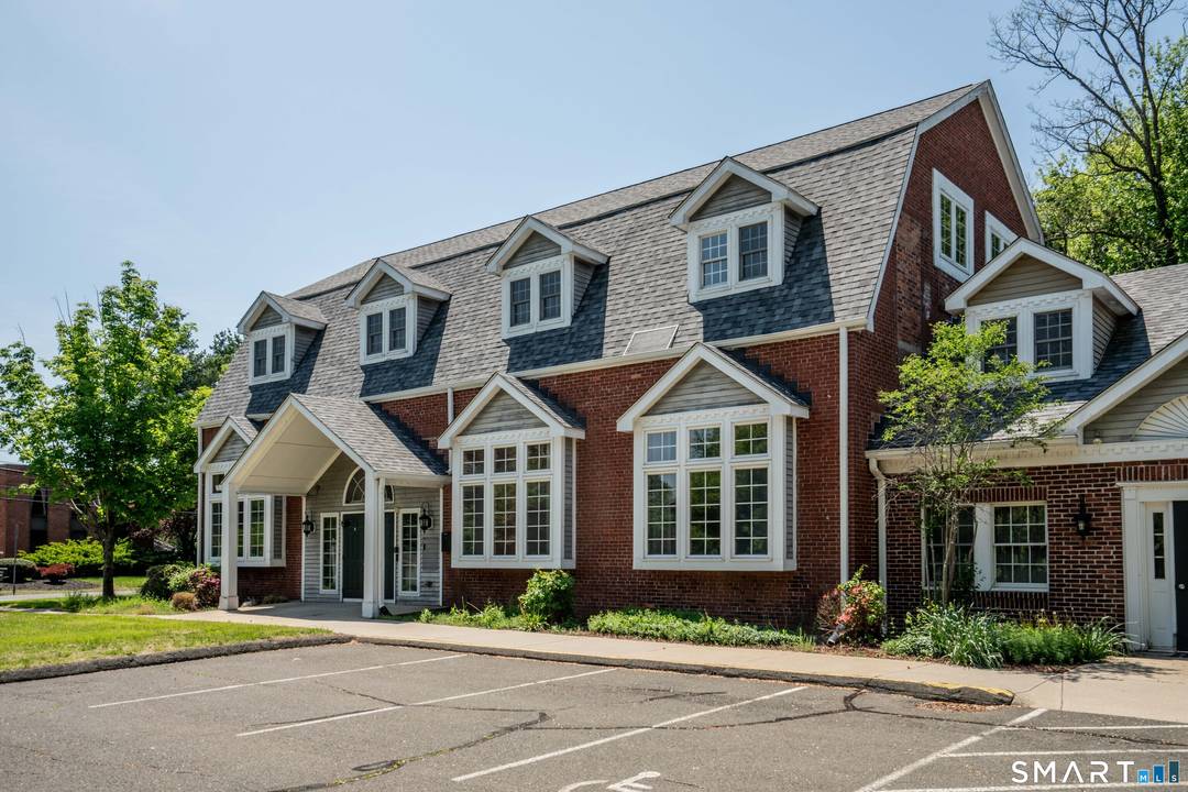 Welcome to 1170 Ellington Rd this architecturally distinctive Gambrel style office building sits on a beautifully landscaped site in an established South Windsor corridor !