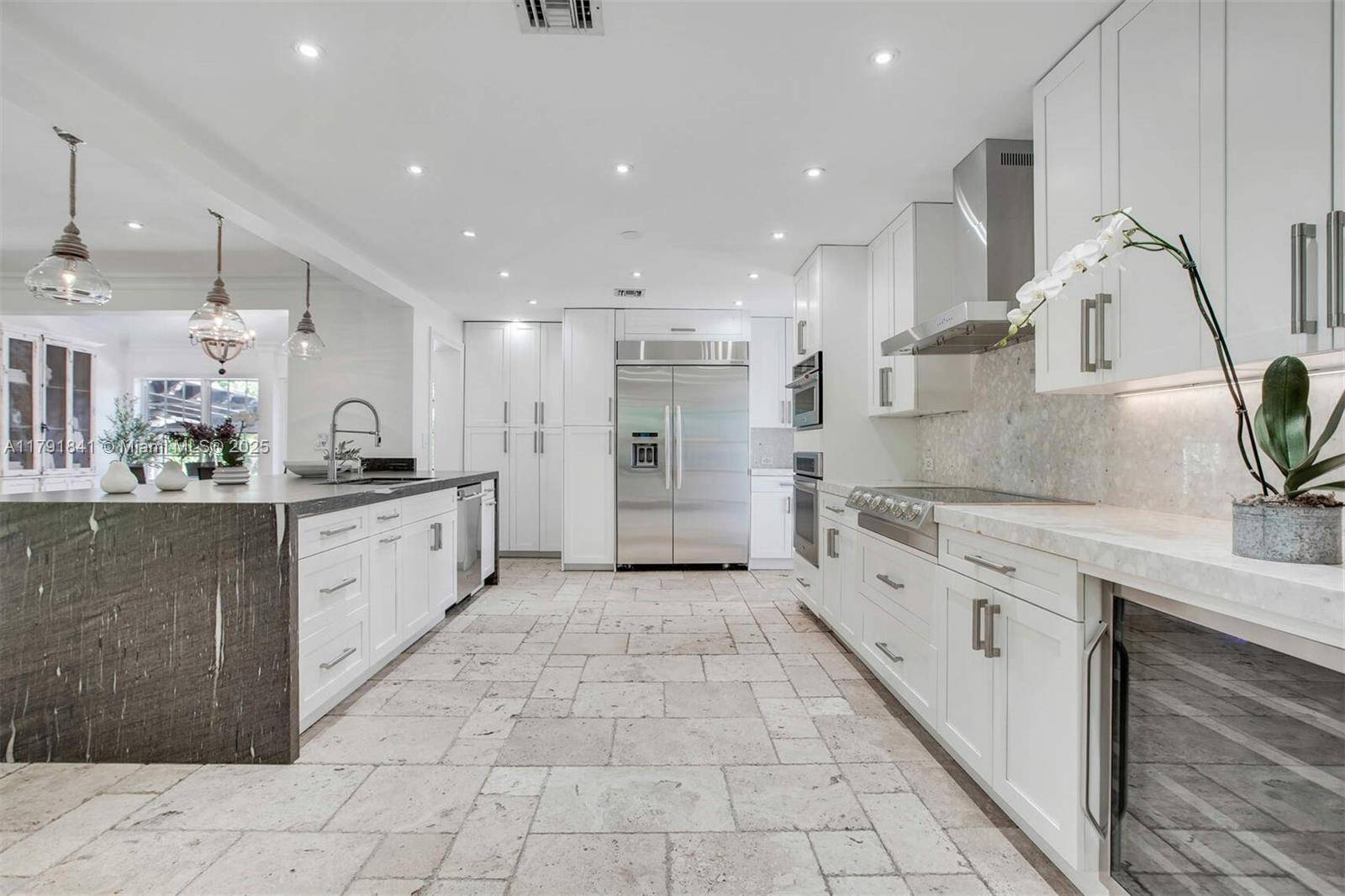 Experience ultimate Coral Gables living with this beautifully designed oasis just blocks from Sunset Place and its restaurants, shops, and entertainment.