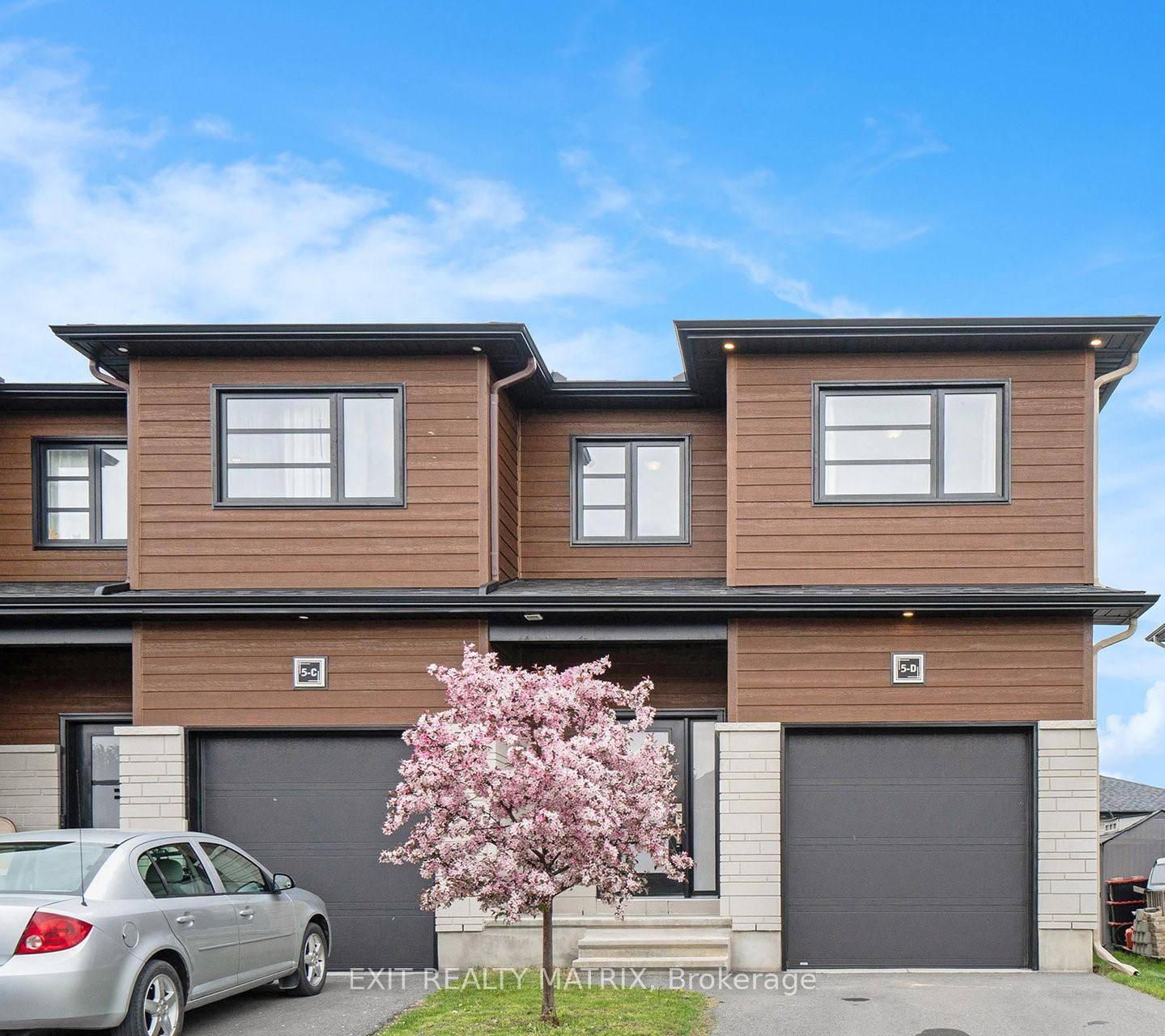Experience modern living in this stylish end unit 2 storey townhouse, ideally situated on a private road in a quiet cul de sac.