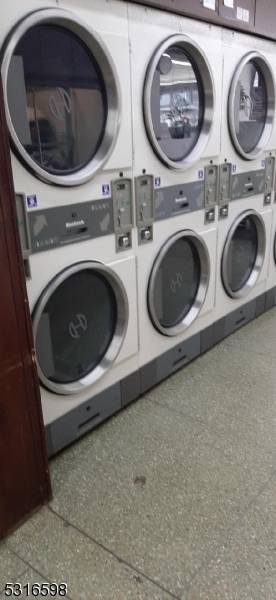 UNBELIEVABLE OPPORTUNITY ; TURNKEY, WELL ESTABLISHED PROFITABLE LAUNDROMAT BUSINESS FOR SALE WITH BULDING IN THE CENTER OF DOWNTOWN SOMERVILLE.