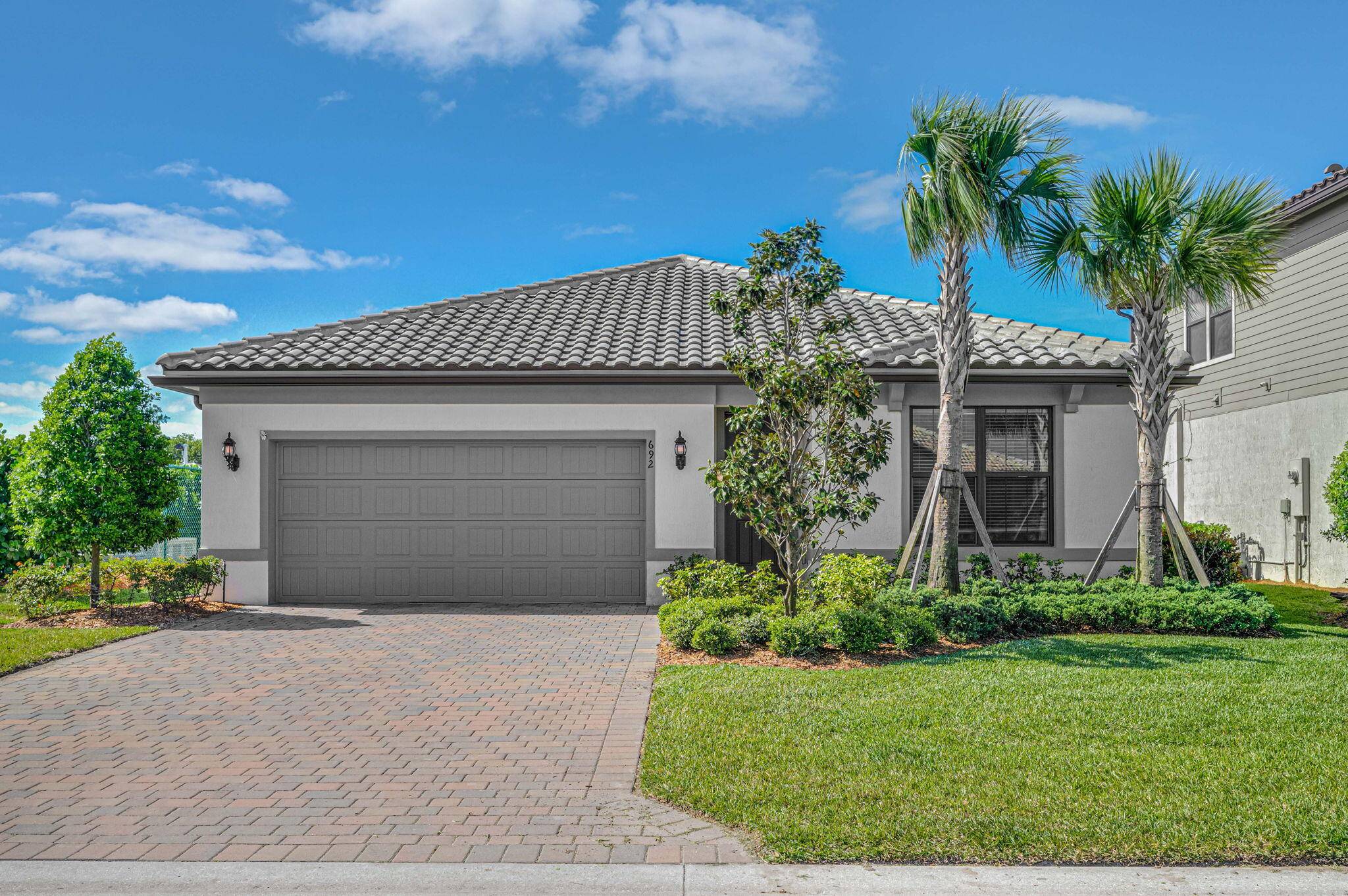 2021 Built 4BDR 2BA 2CG home with full Impact hurricane windows !