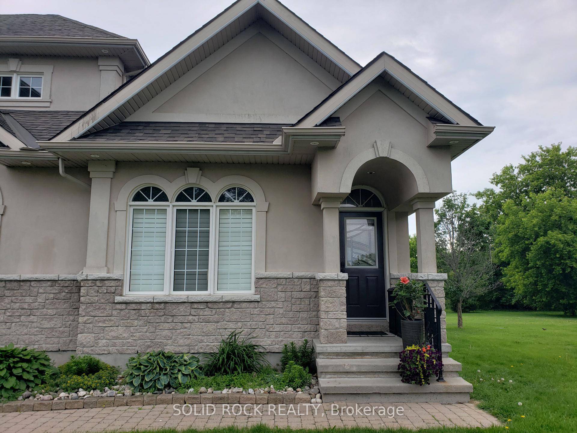 Discover elegant, maintenance free living in this beautifully finished ground level suite, perfectly located on a quiet cul de sac in prestigious Manotick Estates.