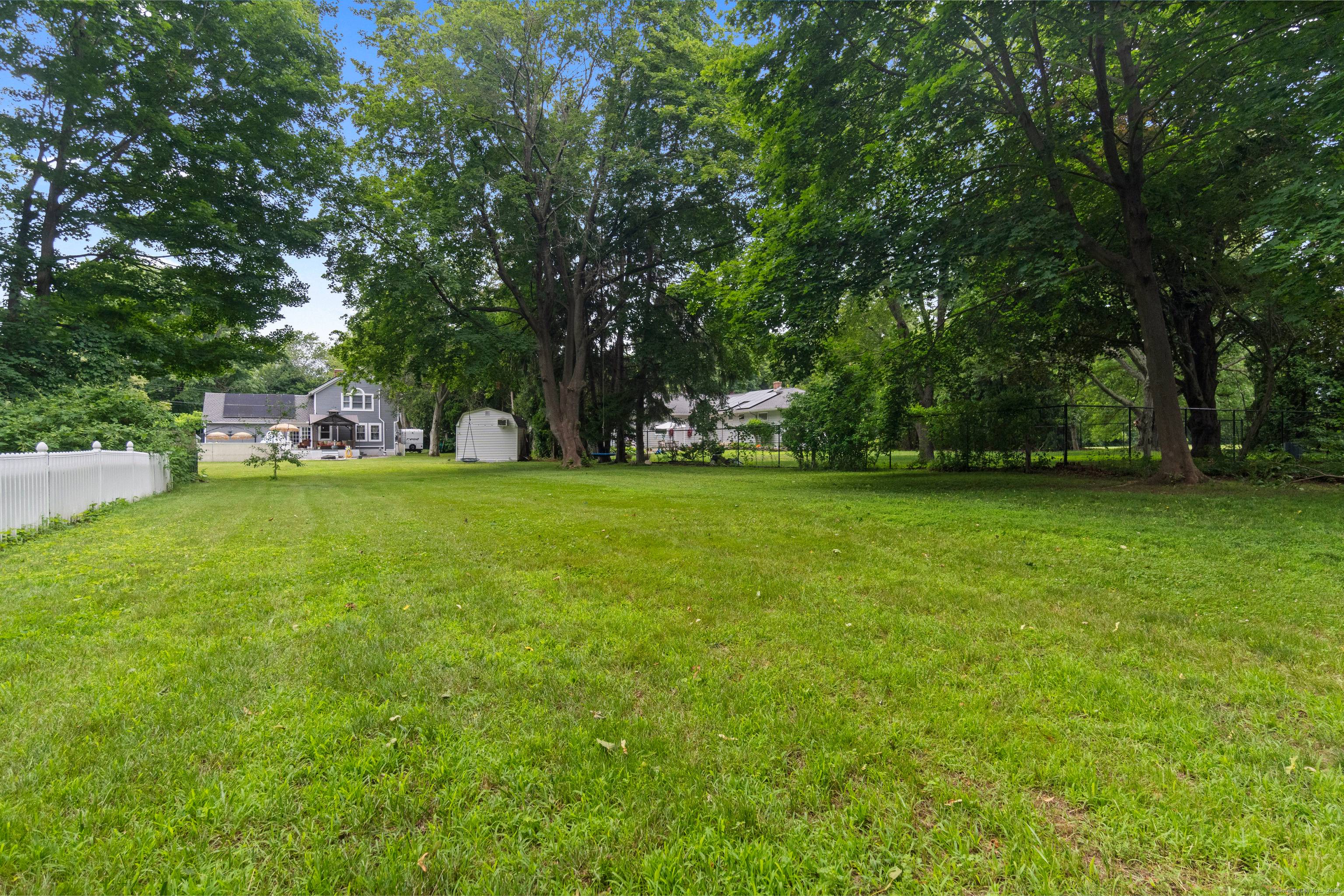 Welcome to 24 Cottage Place a luxury shoreline home offering the perfect blend of elegance, comfort, and an unbeatable Old Saybrook location.
