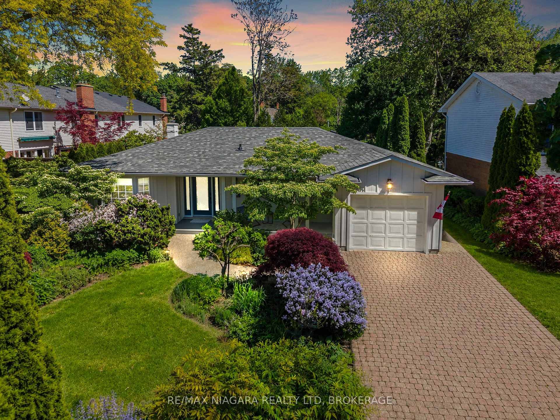 Welcome to 410 Victoria Street, an extraordinary bungalow tucked away in the heart of Old Town Niagara on the Lake, one of the most beautiful and sought after communities in ...